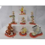 Seven Royal Doulton Winnie the Pooh 'The cooking collection' figures - two 'The little chef', two '