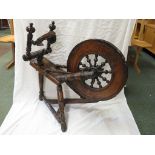 19th century elm framed spinning wheel, height to top of wheel 69cm, with purchase receipt dated