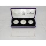 Royal Mint 2002 Accession set of three silver coins (Australian 50 cent, Canadian one dollar, United