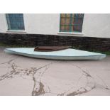 A mid 20th century canvas skinned kayak, pale blue, length 401cm, beam 77cm [maker unknown. This