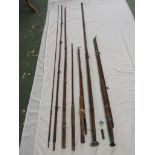 An assortment of fishing rods and canes, generally mid 20th century, no maker's labels, the