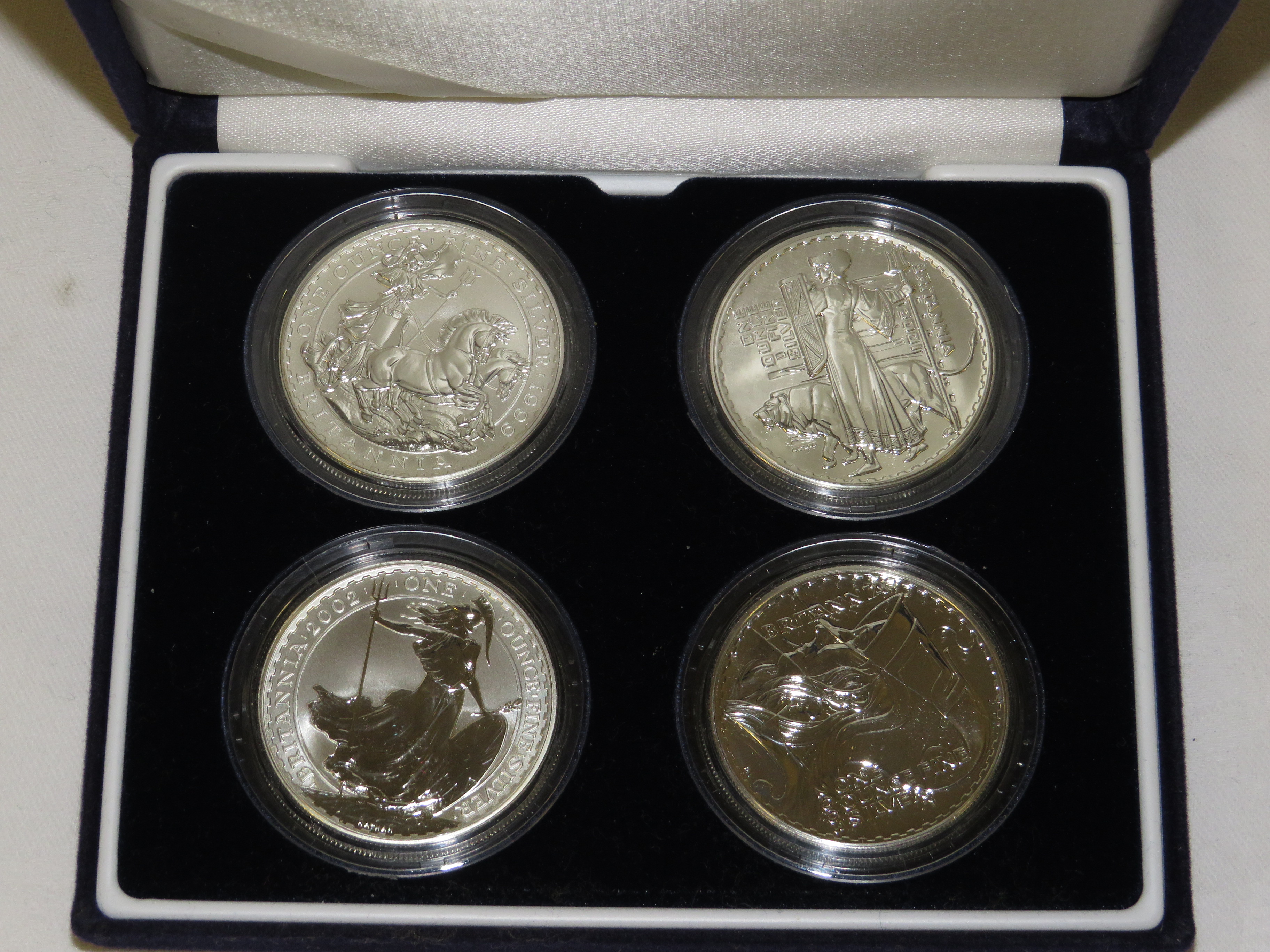 The Royal Mint Britannia Design one ounce silver bullion four-coin set, £2 denomination, with - Image 2 of 2