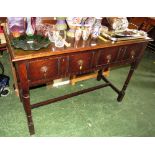 STAINED OAK HALL TABLE WITH TWO DRAWERS AND TURNED STRETCHERED LEGS