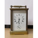 BRASS CASED REPEATING CORNICHE CARRIAGE CLOCK WITH FRENCH MOVEMENT, DIAL SIGNED 'EXAMD. BY DENT',