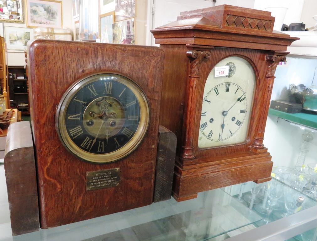 TWO OAK CASED CHIMING MANTLE CLOCKS