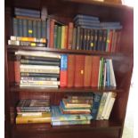 SIX SHELVES OF BOOKS INCLUDING REFERENCE TITLES AND NOVELS