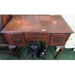 MAHOGANY QUARTER VENEERED DRESSING TABLE WITH THREE DRAWERS AND BRASS HANDLES (A/F)