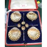 CASED SET OF FOUR SILVER SCALLOP SALTS AND SPOONS WITH BIRMINGHAM ASSAYS