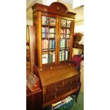 MAHOGANY BUREAU BOOKCASE, UPPER SECTION WITH THREE ADJUSTABLE SHELVES AND CUSHION GLASS DOORS,