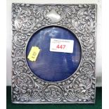 WALKER & HALL BIRMINGHAM SILVER TABLE PHOTOGRAPH FRAME WITH EMBOSSED DECORATION AND VELVET CLAD TO