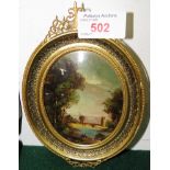 OVAL PAINTED MINIATURE OIL PANEL LANDSCAPE SIGNED 'LIANA' IN GILT BRASS FRAME