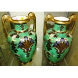 PAIR OF NORITAKE OVOID VASES WITH SCROLLED HANDLES, GREEN GROUND AND GILDED ENAMELLED FOLIATE