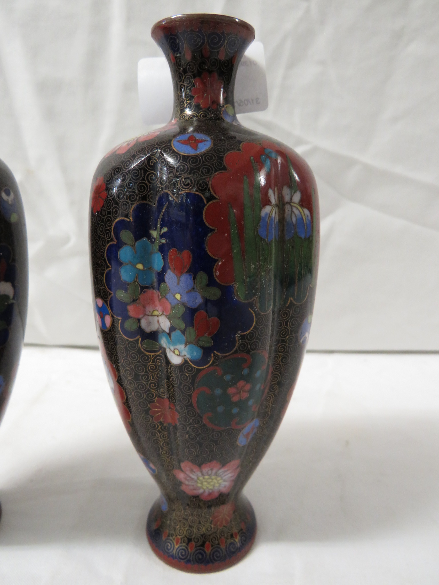 PAIR OF SMALL BLACK GROUND RIBBED CLOISONNE ENAMELLED VASES PATTERNED WITH VARIOUS FLOWERS AND - Image 4 of 5