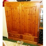 LARGE PINE TWO DOOR WARDROBE WITH TWO DRAWERS TO BASE