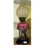 GILT BRASS OIL LAMP WITH GLASS RESERVOIR DECORATED WITH FLOWERS WITH GLASS SHADE AND CHIMNEY