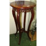 POLISHED MAHOGANY CIRCULAR PLANT STAND WITH CARVED DETAIL AND STRETCHERED LEGS