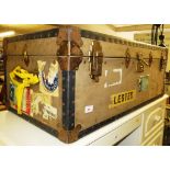 FIBRE TRAVEL TRUNK WITH VARIOUS PASTED LABEL REMNANTS