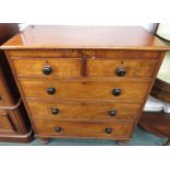 Mahogany chest of two short over three long graduated drawers with ebonised door knobs and brass