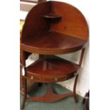 19th century Regency style mahogany corner washstand with boxwood stringing, the lower shelf with