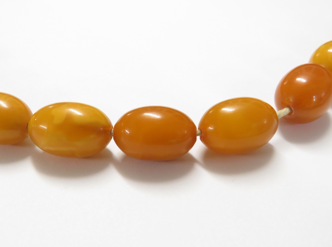 A necklace of graduated amber beads, length about 112cm, the largest bead approximately 3cm long - Image 3 of 6