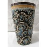 Doulton Lambeth stoneware beaker with silver rim, glazed in blues and greens with scrolled flowers