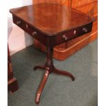 Victorian mahogany tripod work table with turned single pedestal on swept legs with a single