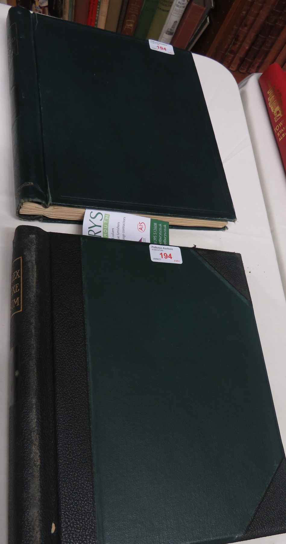 A green Utile hinged leaf album containing early Palestine, Persian and Peruvian stamps, etc; and