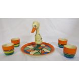 A Clarice Cliff Bizarre duck egg cruet, the stand with an orange border and stylized leaf pattern in