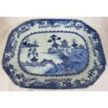 A porcelain dish or charger of octagonal oblong shape, decorated in underglaze blue in the Chinese