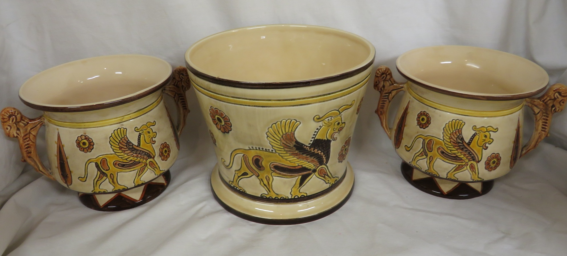 Sylvac pottery Assyrian pattern - two vases, decorated in browns and yellows with winged beasts