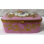 Le Tallec porcelain box with hinged lid, pink ground with gilded scrolled foliage, the lid and