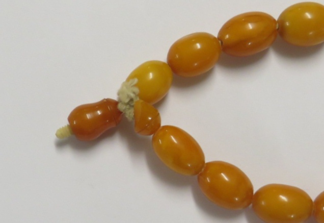 A necklace of graduated amber beads, length about 112cm, the largest bead approximately 3cm long - Image 5 of 6