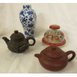 Four Far Eastern ceramics - a Yixing type pottery teapot with impressed marks to base, within the