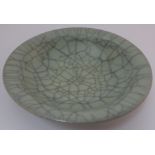 Chinese Guan type circular dish, stoneware with crackled celadon glaze, diameter 17.6cm, depth 4.