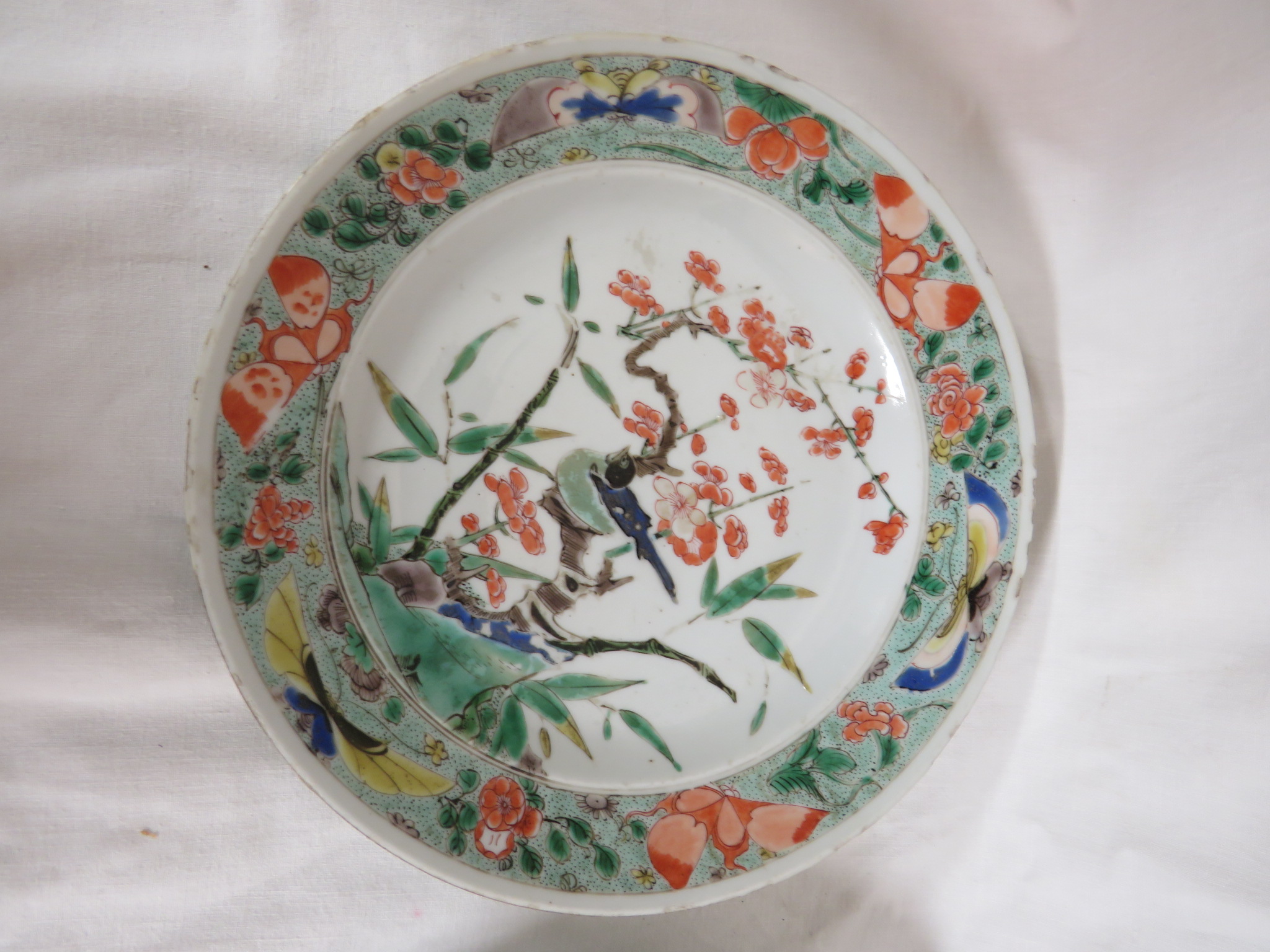 Two Chinese porcelain plates enamelled in the famille verte palette with flowering branch and - Image 2 of 10