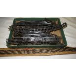 Box of OO gauge track, straight and curved sections, the majority marked Made in England, a small