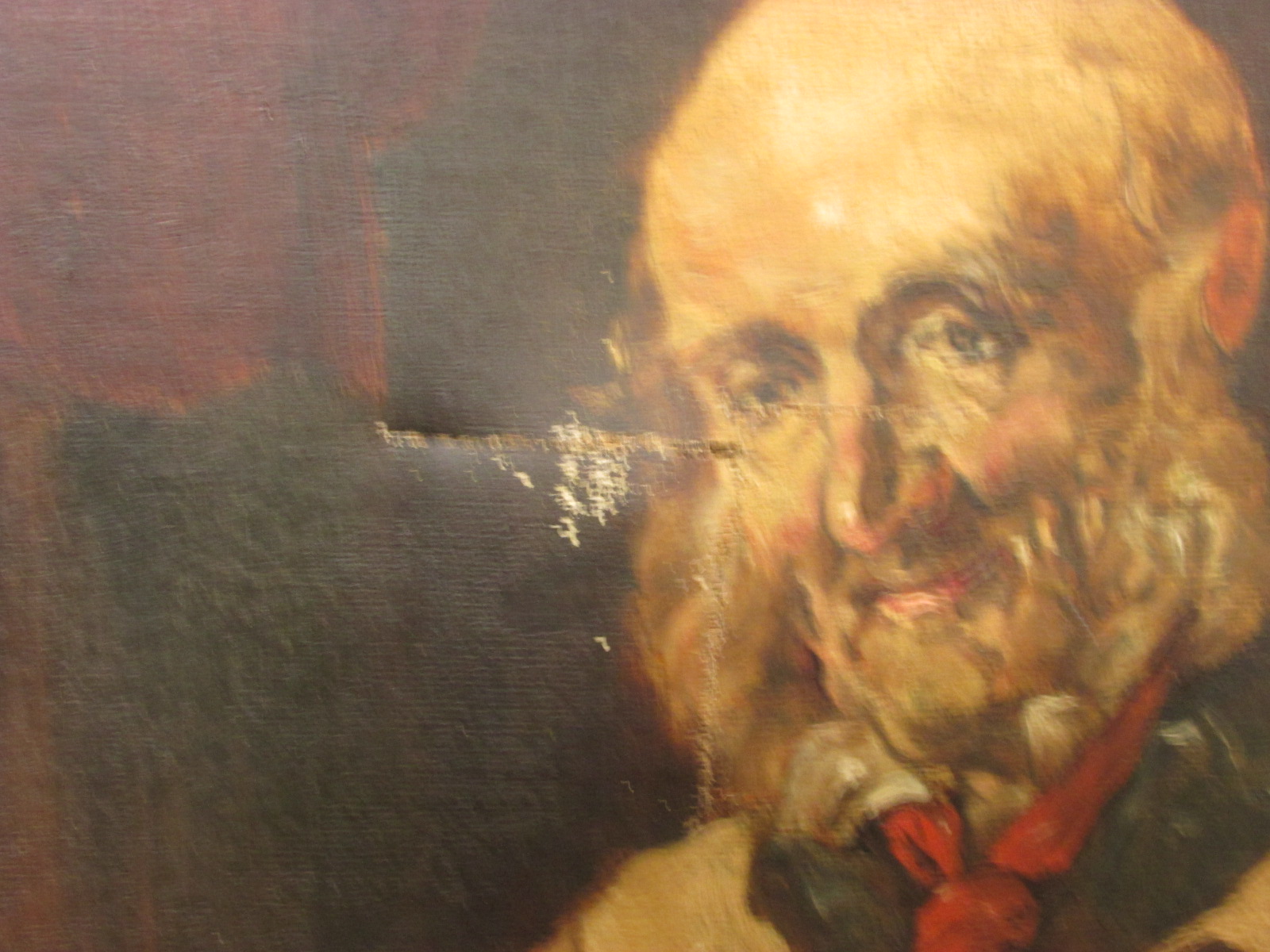 Man in smock brushing hat, oil on canvas, no signature, (47cm x 31.5cm), in a moulded gilt gesso - Image 2 of 2