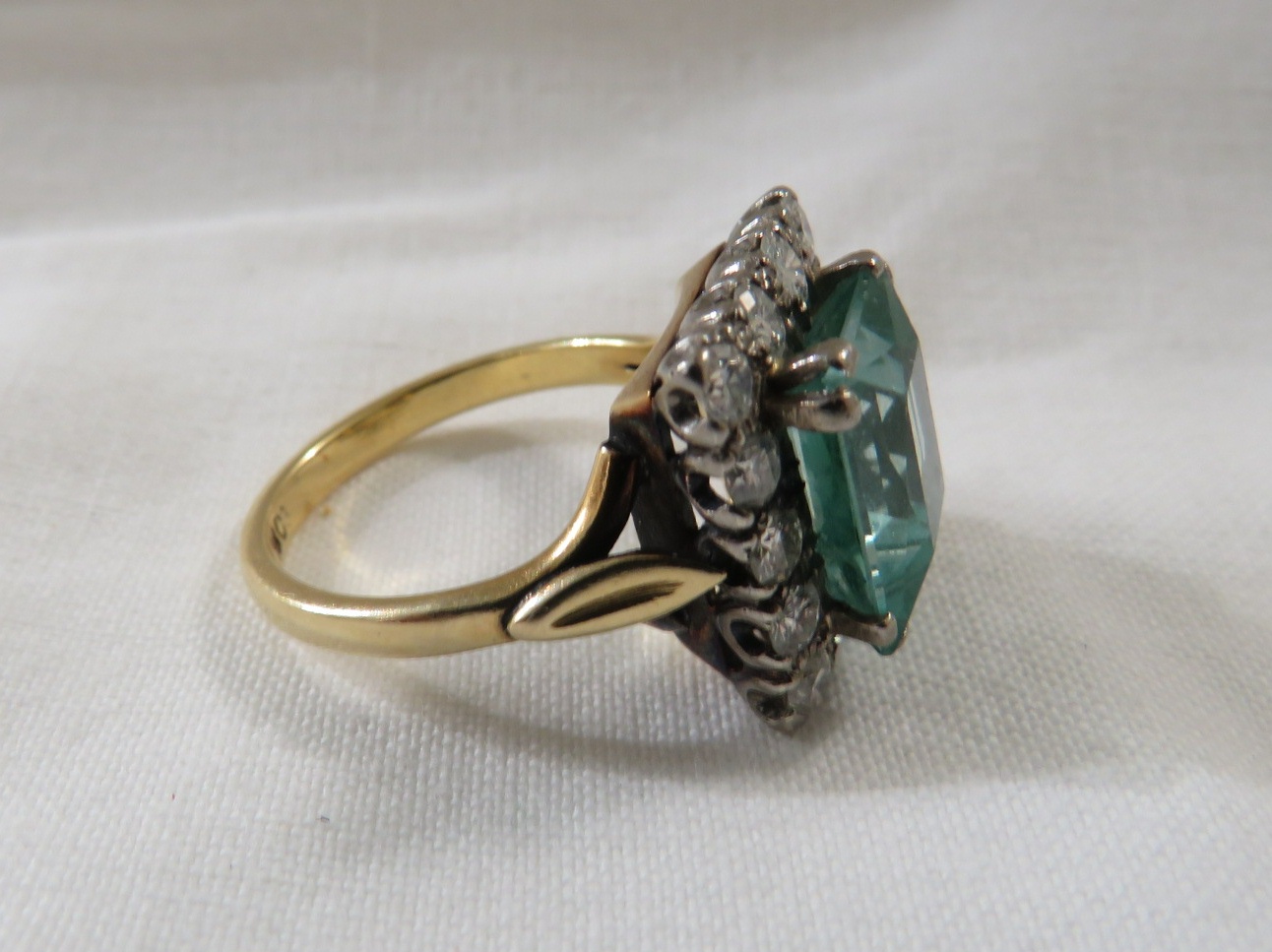 18ct gold ring set with an aquamarine (emerald cut 11.5mm x 10mm approximately) within a border of - Image 3 of 3