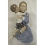 Royal Copenhagen porcelain figural group of mother and child, number 3457, impressed initials FC,