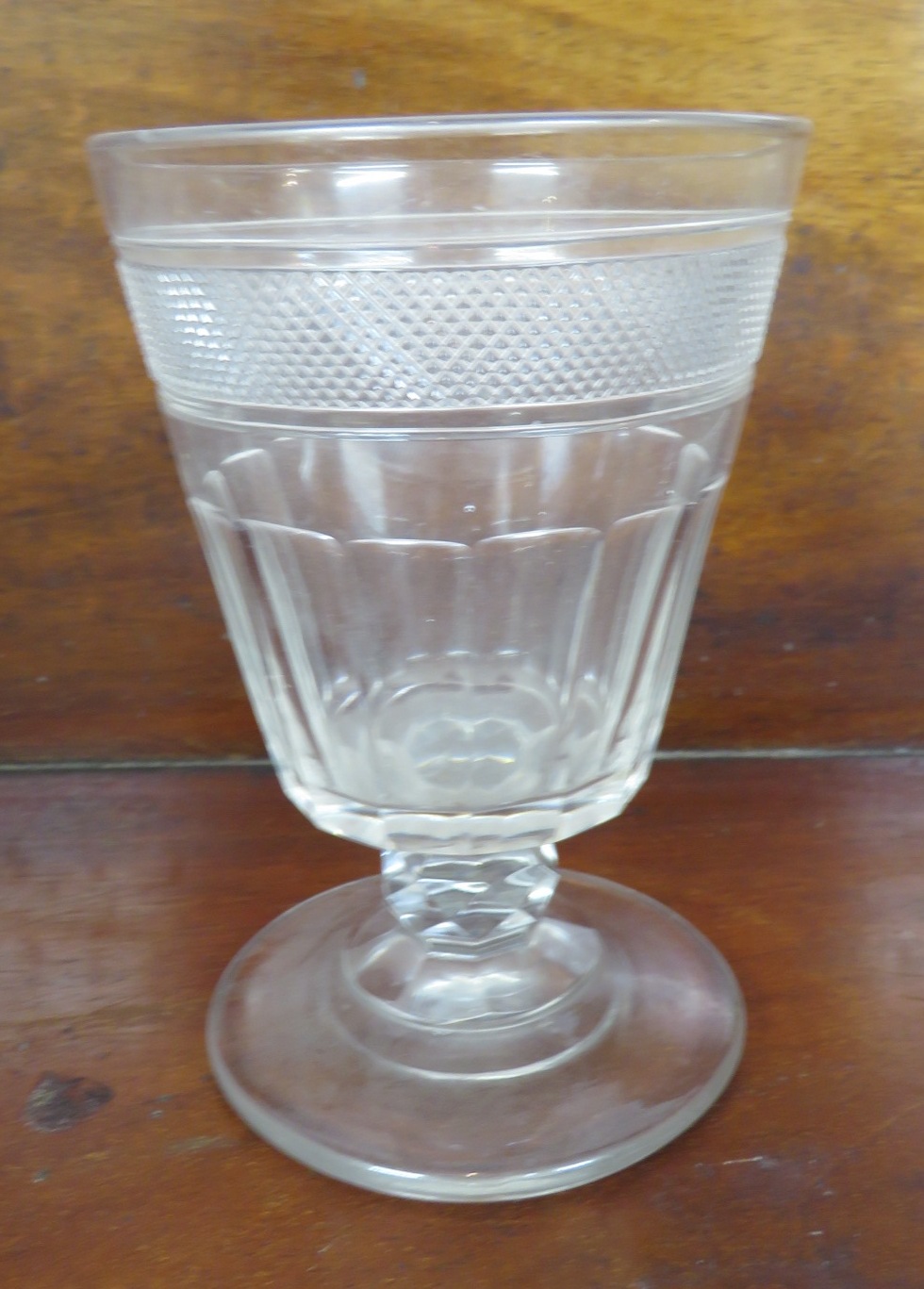 Rummer with a diamond cut band, faceted knop, on a circular foot, height 13cm