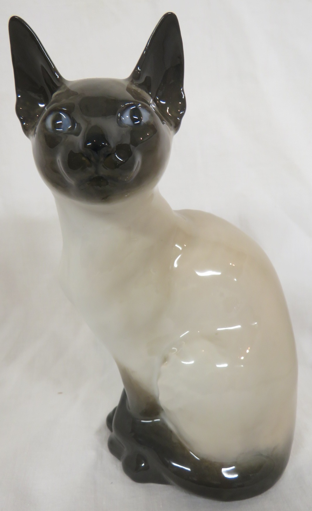 Royal Copenhagen porcelain figure of a seated Siamese cat, numbered 3281 (height 19cm)