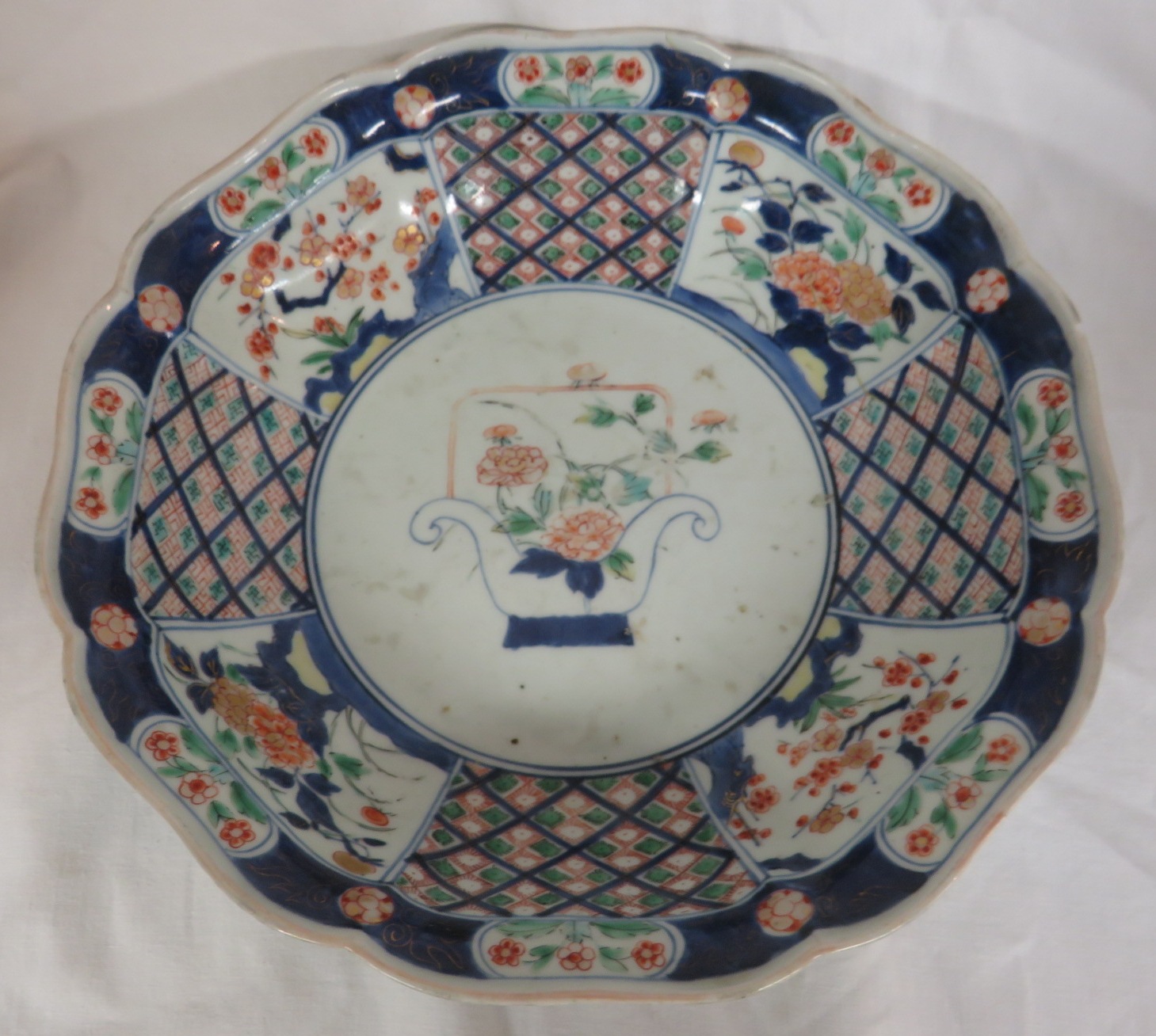 Chinese porcelain rounded octagonal bowl decorated in the famille verte palette with under glaze