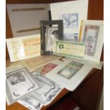 A folder containing facsimiles of bank notes, Sudanese postal orders, specimen bank notes of