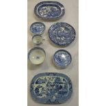 A small assortment of blue and white transfer decorated pottery - an oval dish, a pierced meat