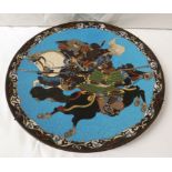 Japanese Cloisonné metal dish depicting two mounted warriors in battle against a blue ground,