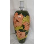 Moorcroft pottery hibiscus table lamp, tall ovoid shape, green ground, pink flowers, the base