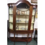 Edwardian mahogany bow fronted serpentine topped china display cabinet, geometric stringing and