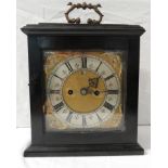 A Victorian chiming bracket clock in an ebonised case, the silvered Roman chapter with outer ring at