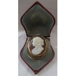 Large oval cameo brooch depicting woman's head in profile, gold plated mount with wirework, (