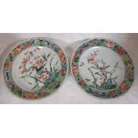 Two Chinese porcelain plates enamelled in the famille verte palette with flowering branch and